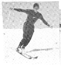 Američan Doug Pfeiffer na dolgih smučeh med zavojem leta 1958, kjer je imel roke v položaju kot Clif Taylor.